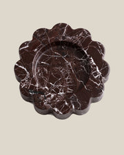ATOMS Mini Sun Tray in Rosso Levante, three-quarter view on BONE background; 12.5 cm diameter and 2 cm thick.