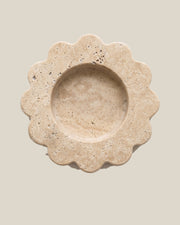 ATOMS Mini Sun Tray in Travertine Beige, near-top view on BONE background; 12.5 cm diameter and 2 cm thick.