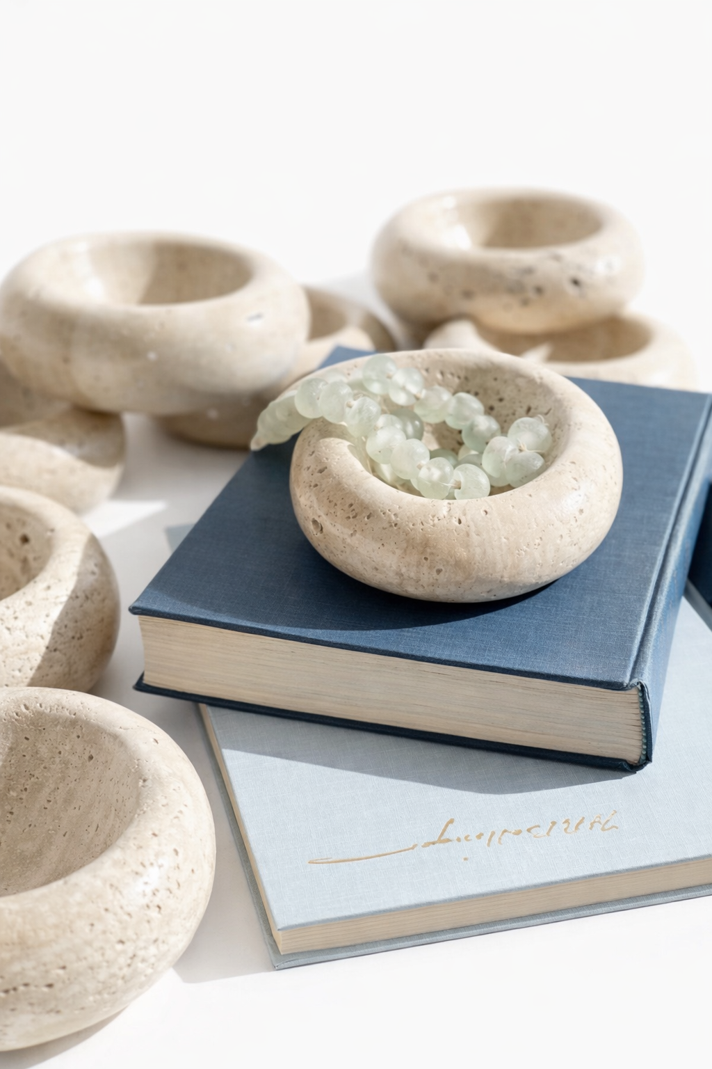 CONTOUR BOWL IN TRAVERTINE