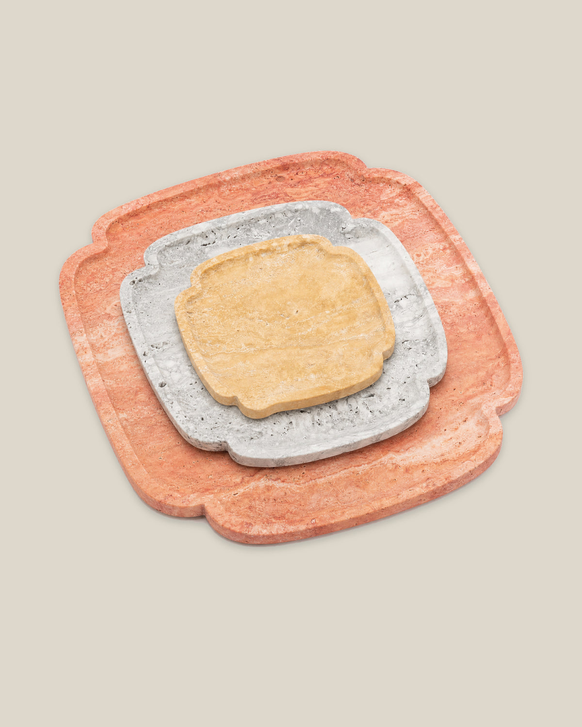 Stephane three-piece travertine set: small yellow, medium grey and large red