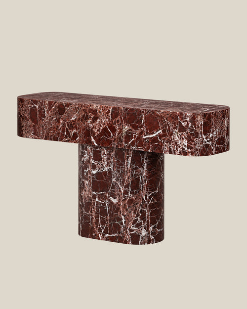 BUTTER console table by CARVINGS in Rosso Levante Marble, on a BONE background, right view.