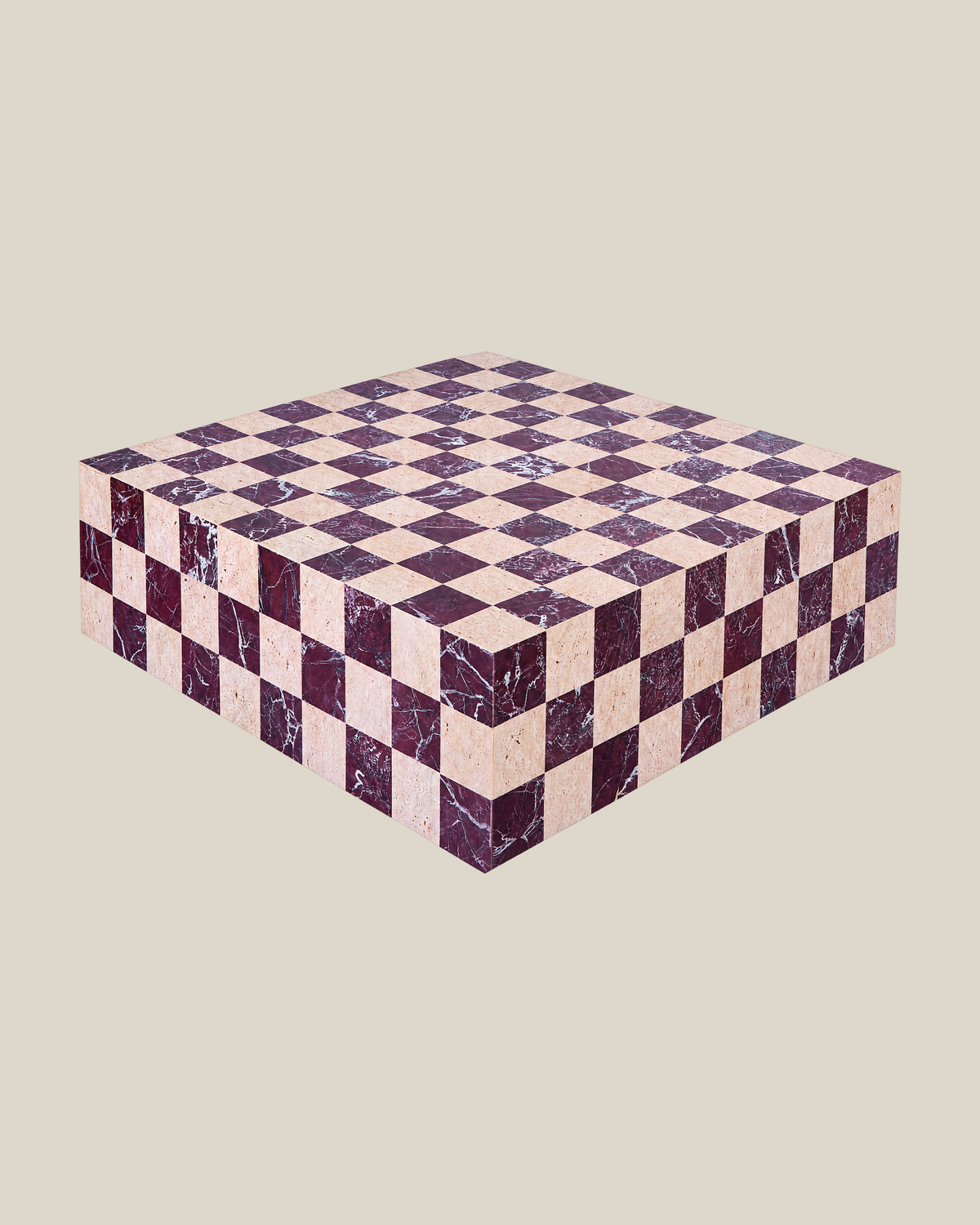 CHEQUERED Coffee Table in Travertine Beige and Rosso Levante, three-quarter view on Bone background