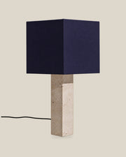 Roma Table Lamp, Large Square, Travertine Beige + Dark Blue, on a bone background.
