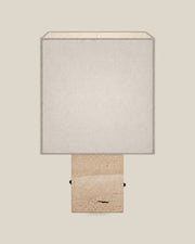 Roma Table Lamp, Small Square, Travertine Beige + White, front hero view on bone background.