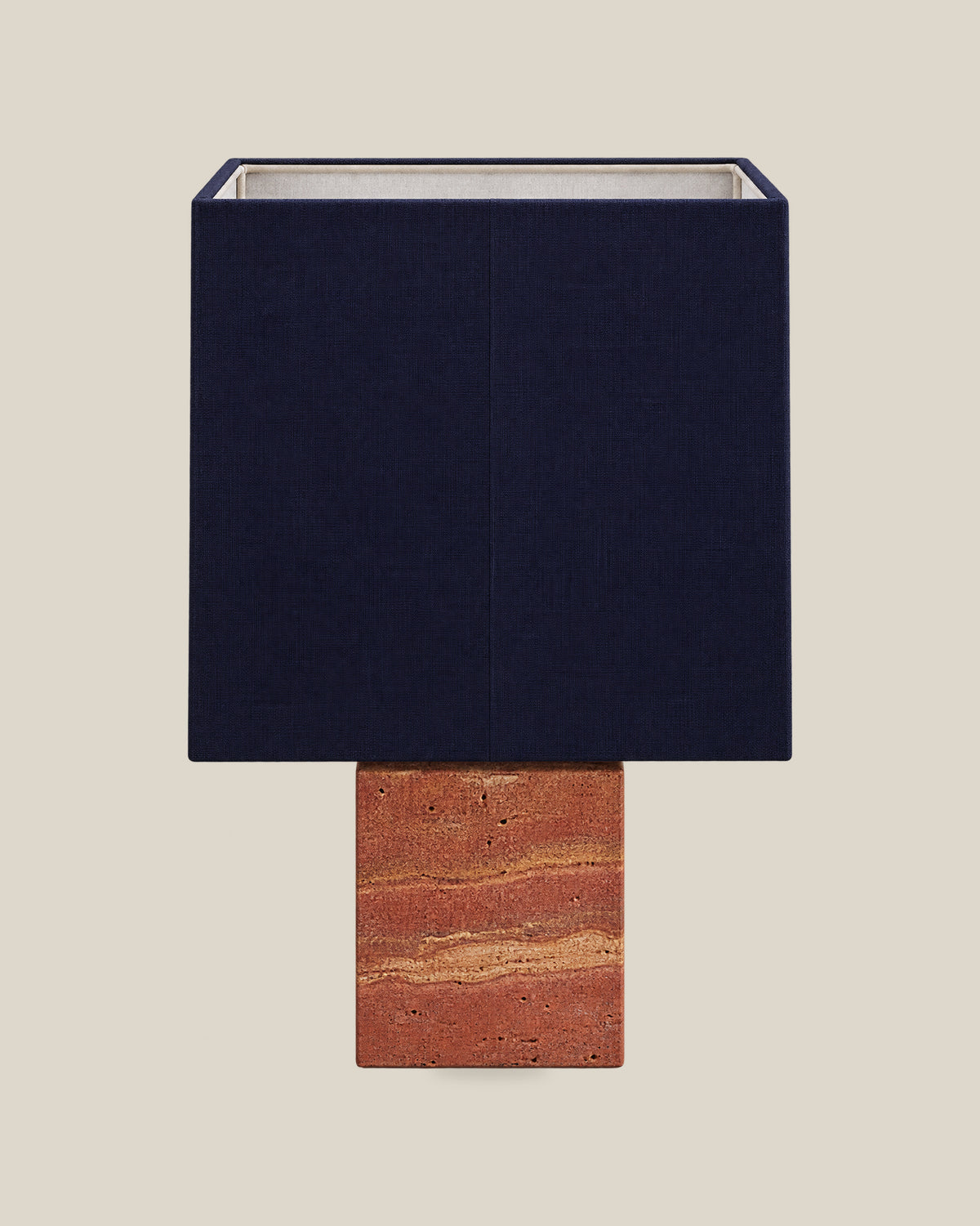 Roma Table Lamp, Small Square, Travertine Red + Dark Blue, front hero view on bone background.