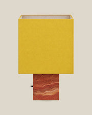 Roma Table Lamp, Small Square, Travertine Red + Yellow, front hero view on bone background.