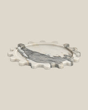 Sun Orbit Tray in Limited Edition Calacatta Borghini natural marble, low front view, rounded sun rays and recessed circular centre.